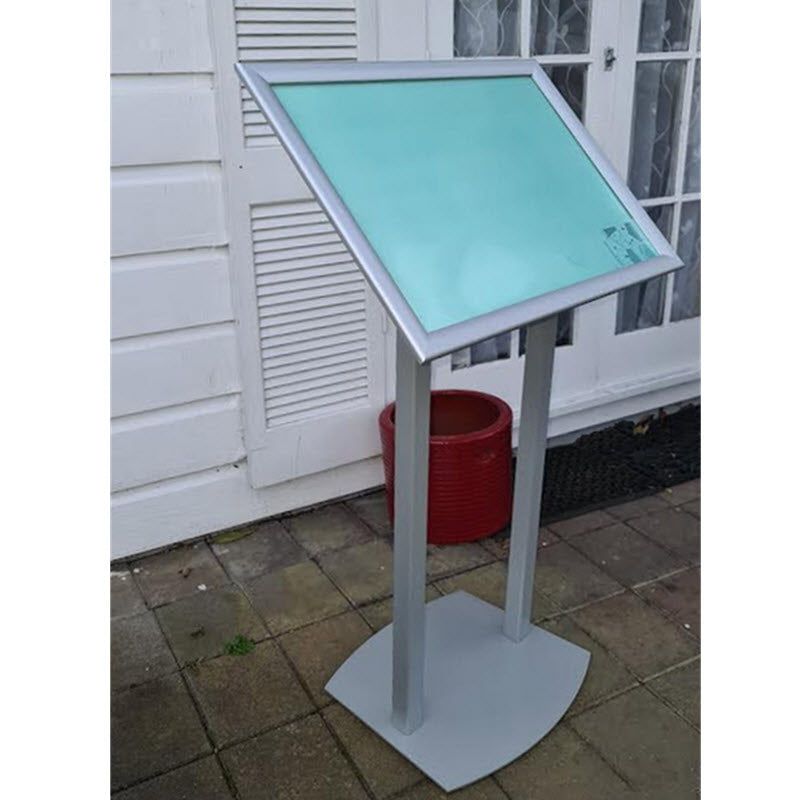 silver Restaurant Menu Stand / Commercial Poster Display stand. Designed by us to meet Client Requests, Components NZ Manufactured. Features A2 Landscape format Waterproof Wide Profile Snap Fame Display Format Allows for Multiple Display Options