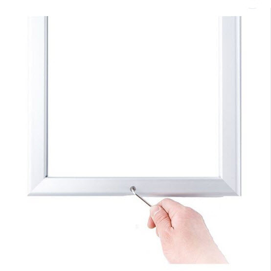 Mitre cornered A4 Silver Tamper proof - Lockable snap frame The 32mm wide sprung frame clips open from the front and around all four sides. The Snap frame system makes changing graphics easier without having to remove the frame from the wall each time. Frames can be affixed / displayed in portrait or landscape orientation Supplied with an non reflective, easy clean PVC cover sheet to protect your poster, allen key and fixing screws. They are locked using the Allen key supplied to prevent tampering.
