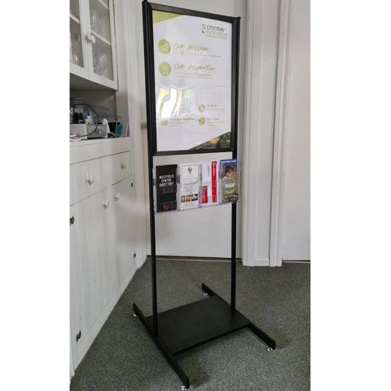  Top insert design for Double sided easy A2 graphic changes 2 x Protective pvc poster cover sheets Accommodates A2 graphics 594mm h x 420mm w Base 600mm d. with 4 x adjustable feet Custom design allows for 4 pocket DLE leaflet holder single or double sided Simple design Black finish for use in any indoor environment Easy assembly with instructions,