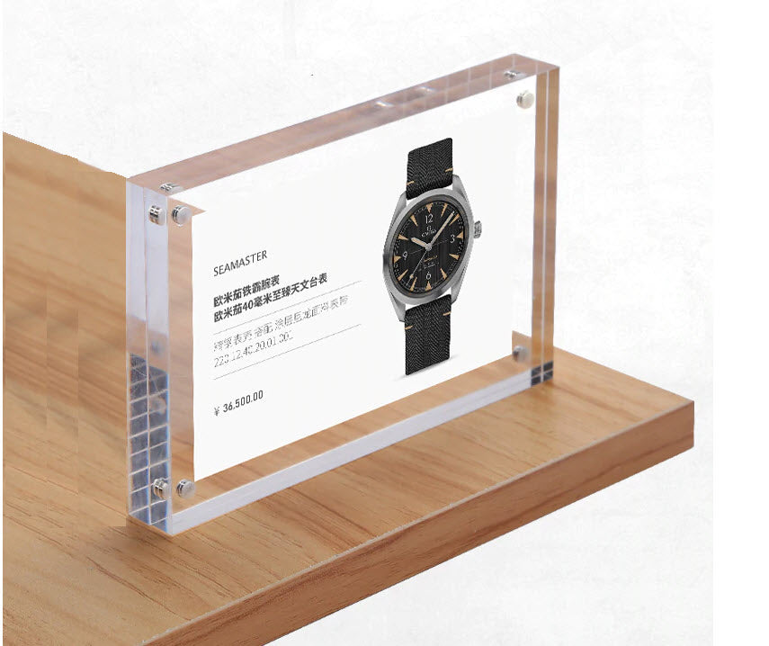 These elegantly styled POS acrylic magnetic holders can be used for any number of display solutions. Provides for 6 x 4" standard photograph size, or A7 sheet display with clear border within magnets, or larger as required to show product information. Acrylic block size of 150mm x 100mm (4" x 6" ) Display can be either Portrait or landscape Can be used freestanding vertical or flat on countertops, adjacent to product as a sales promoter or ticketing solution