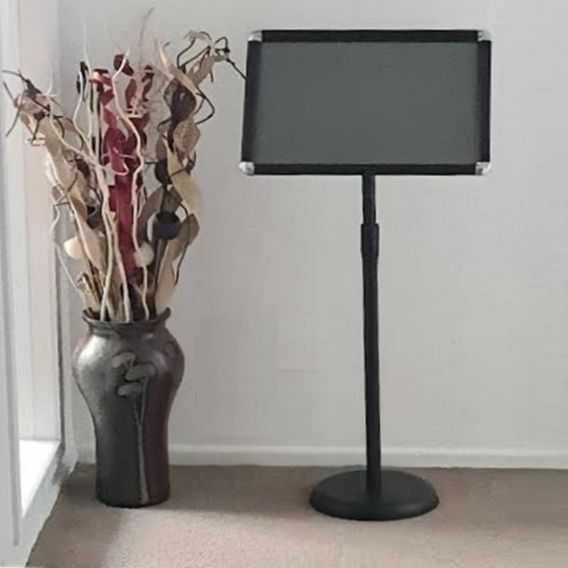 Adjustable Snap Frame Floor Stand A3 Can be used both Portrait or Landscape style Angle of Display Adjustable Black Pole With Height Adjuster 620-1075mm to centre of frame, Suitable for indoor signage application - A3 sized sheet display 297mm x 420 mm Ideal uses- Conferences, Hotels, Events, Route Indicator, Menu, and Information displays. Creates a stylish Information display . Powdercoated Black, locking height adjustable pole
