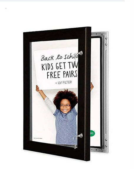 Weatherproof Black Outdoor Lockable Poster Frame A2 Colour -Anodized Black Features 44mm Wide Aluminum Extrusion Rubber Gasket Seals Polycarbonate Front Panel for Durability Rear panel Coreflute Waterproof. A2 Size Poster Easily Changed With Retaining Clips Supplied Hinged Opening with hold out stays