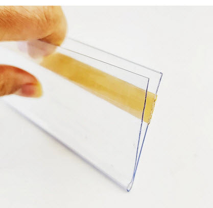 Pack of 25 x Quantity, 80mm x 26mm Clear Label Holders Flat Clear PVC Ticket Strip Self Adhesive Ticket / Label Holders Affix to Shelf Edge, or to Flat Face of Cupboards/ Lockers etc. Forms a Protective Ticket Display Holder 80mm wide to hold paper 26mm high Can be used to holder higher tickets standing upright Paper Ticket / Display easily inserted and changed as required.