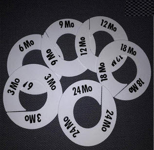 Rack Dividers White Round Baby Sizes 3 months - 24 months Set of 6 Durable Plastic Printed Black Lettering to both sides 3 Mo, 6 Mo, 9 Mo, 12 Mo, 18 Mo, 24 Mo 88mm Diameter with 40mm Centre.
