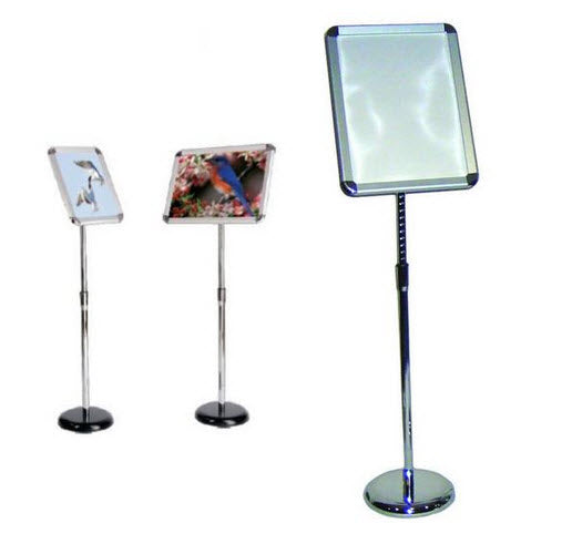 Snap Frame Floor Stand A3 To suit A3 Size Paper Displays 420mm x 297mm Clear PVC Protective Cover Sheet to Protect Display Poster. Rotates for both Portrait or Landscape format Displays Angle of Display Adjustable Round Chrome Base with Polished Telescopic Pole Pole Height Adjustable 710mm - 1240mm Wide Profile Radius A3 Aluminum Silver Snap Frame Opening all 4 Snap Frame Sides with Chrome Radius Corners to Display Frame Melamine Backing Pane