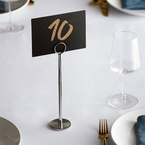 This simple and convenient 10" stainless steel menu / card holder is the best way to showcase your specials out in the open. This piece features a ring top to attractively display information right on your tabletop.